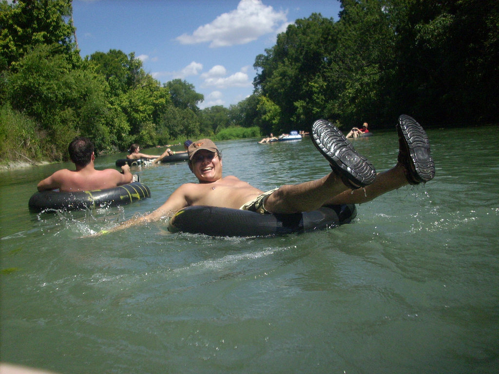 enjoying a nice float down the river on an inner tube