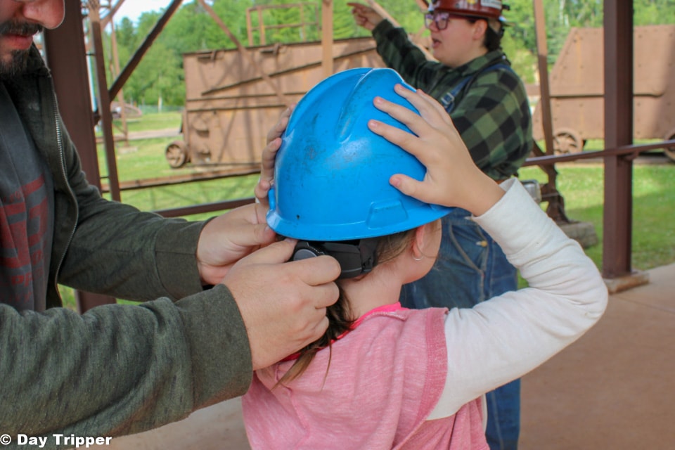 Putting a helmet on at the Soudan Underground Mine