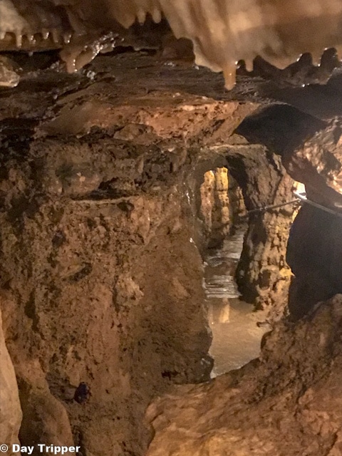 Walking the tight halls of Crystal Lake Cave