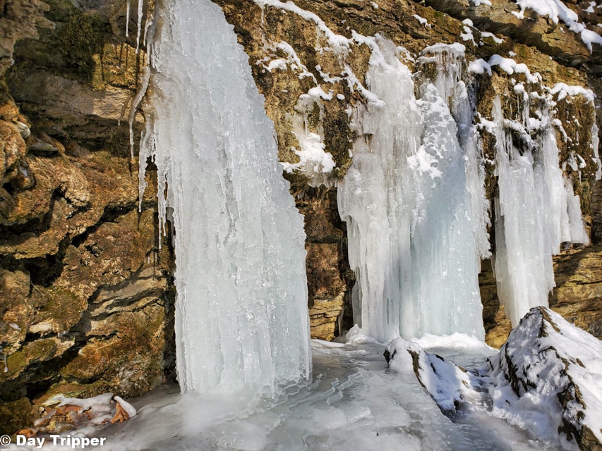 Frozen icicles on the rocks at hidden falls regional park in winter