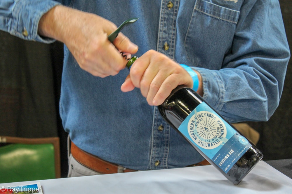 Opening another bottle at Clink Wine Festival